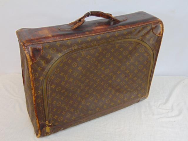 Vintage Louis Vuitton soft case suitcase, front zipper, garment case, nice patina, case is 18" by: Vintage Louis Vuitton soft case suitcase, front zipper, garment case, nice patina, case is 18" by 23" by 8",