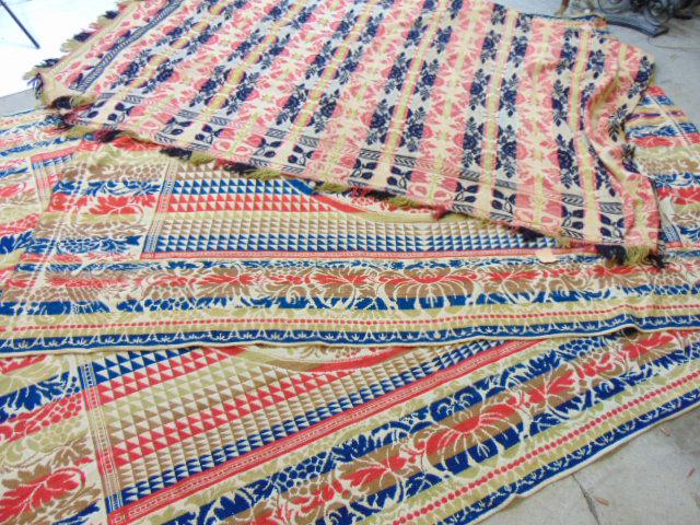 3 Linsey Woolsey coverlets, multi colored, includes 1843 coverlet made by J. Fritzinger, Allentown,: 3 Linsey Woolsey coverlets, multi colored, includes 1843 coverlet made by J. Fritzinger, Allentown, floral decorated in colored bands 70" by 91"; coverlet with eagles & circular center, unsigned, 76" 