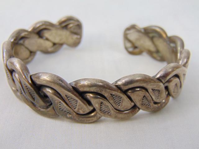 Jewelry. Native American sterling HRM, Harry R. Morgan cuff/bracelet, Old Pawn, heavy braided cuff: Jewelry. Native American sterling HRM, Harry R. Morgan cuff/bracelet, Old Pawn, heavy braided cuff w/ stamp design, 3/4" opening gap; 88.12 grams; 1/2" wide; 7 1/4" circumference w/o gap. good conditi