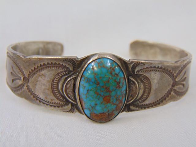 Jewelry. Native American Turquoise sterling Old Pawn cuff/bracelet, oval central stone, stampwork,: Jewelry. Native American Turquoise sterling Old Pawn cuff/bracelet, oval central stone, stampwork, 1' opening gap, 29.29 grams; 3/4" wide; 5 7/8" circumference. good condition
