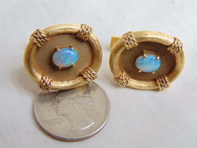 Jewelry. Men's 14kt yellow gold large Opal cufflinks, 22.34 grams, 7/8" long x 3/4" wide, oval opal: Jewelry. Men's 14kt yellow gold large Opal cufflinks, 22.34 grams, 7/8" long x 3/4" wide, oval opal set in 4 prongs approx 7mm, good condition