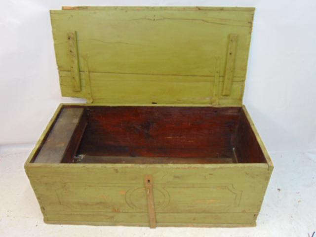 Green painted blanket box with carved flower (tulip) decoration in lid, box is 48" by 25", height is: Green painted blanket box with carved flower (tulip) decoration in lid, box is 48" by 25", height is 20"