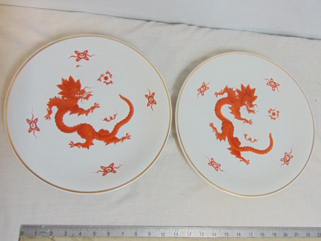 Pair Meissen chargers with Asian, Chinese decoration, dragons, white porcelain with red dragons,: Pair Meissen chargers with Asian, Chinese decoration, dragons, white porcelain with red dragons, gilt rim, each charger is 12" in diameter, both in good condition, no cracks, chips.