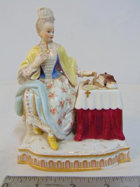 Meissen porcelain figure, woman by vanity, dressing table, as is, mirror and part of hand missing,: Meissen porcelain figure, woman by vanity, dressing table, as is, mirror and part of hand missing, part of hair missing, chips around base, part of shoe, foot missing, height is 5.5"