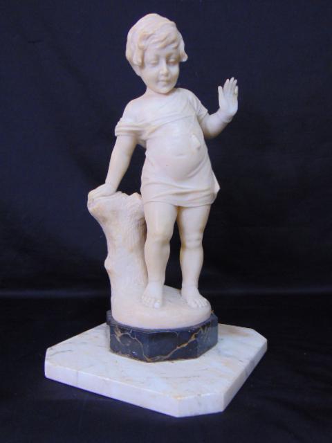 Carved alabaster figure of a child, leaning on a tree stump, on black marble base, repaired finger,: Carved alabaster figure of a child, leaning on a tree stump, on black marble base, repaired finger, chipped toe, unsigned, height is 16.5", appears to be stuck to the white marble top of a pedestal
