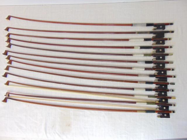 13 signed violin bows in case, Hermann Richard Pfretzschner, Adolf C. Schuster, Mathias Thoma,: 13 signed violin bows in case, Hermann Richard Pfretzschner, Adolf C. Schuster, Mathias Thoma, Egidius Dorfler, Albert Nürnberger, Bausch, Conrad Gotz, Célestin Emile Clasquin, E. Gartner, Stuttgart