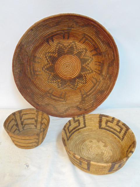 3 Native American coil baskets, includes large basket with low edge, 16.5" in diameter, medium: 3 Native American coil baskets, includes large basket with low edge, 16.5" in diameter, medium basket with high edge 9" (has loss on edge), & small basket, 6" in diameter, height is 3 1/8"