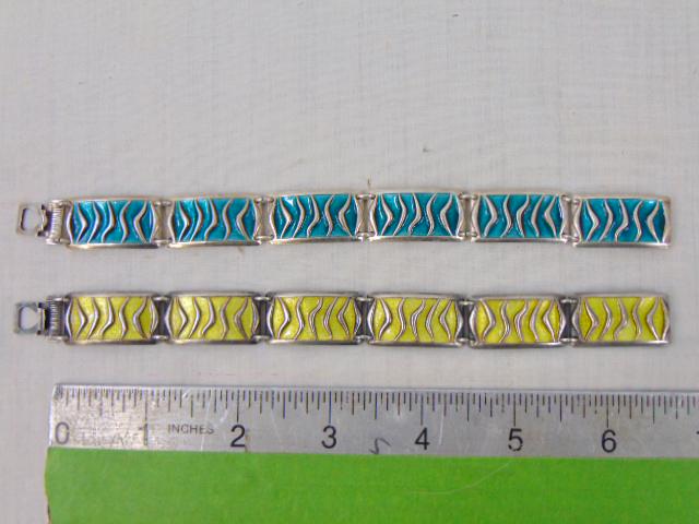 Jewelry. (2) Vintage David Andersen sterling enamel wave bracelets, Norway. both 1/2" wide & 7": Jewelry. (2) Vintage David Andersen sterling enamel wave bracelets, Norway. both 1/2" wide & 7" length, 33.15 grams green, 30.82 yellow, good condition, fully hallmarked.