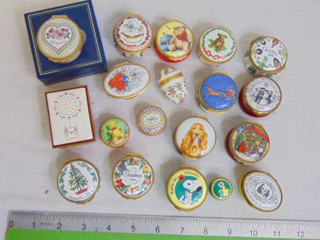 Collection of Cartier & Halcyon enamel boxes, Christmas, Snoopy, floral, bears, includes 19 small: Collection of Cartier & Halcyon enamel boxes, Christmas, Snoopy, floral, bears, includes 19 small enameled boxes.
