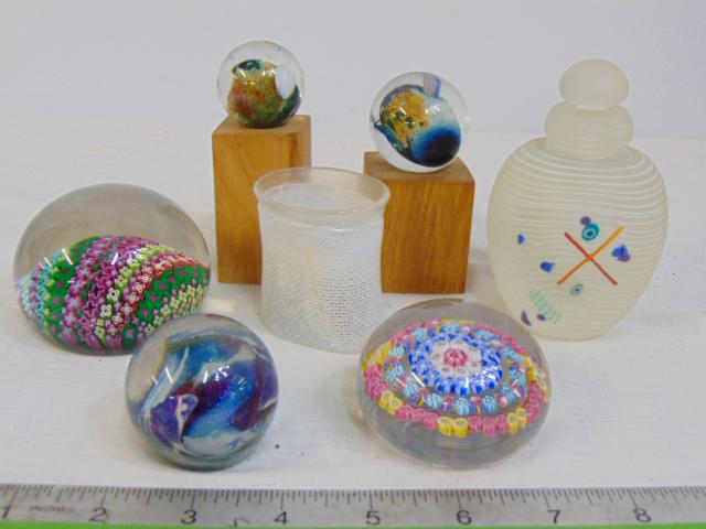 art glass lot, Baccarat paperweight, Eckert paperweight, Seeger (?) paperweight, two art glass balls: art glass lot, Baccarat paperweight, Eckert paperweight, Seeger (?) paperweight, two art glass balls on wood bases, small frosted glass vase by Boda, frosted glass perfume bottle with spiral decoratio