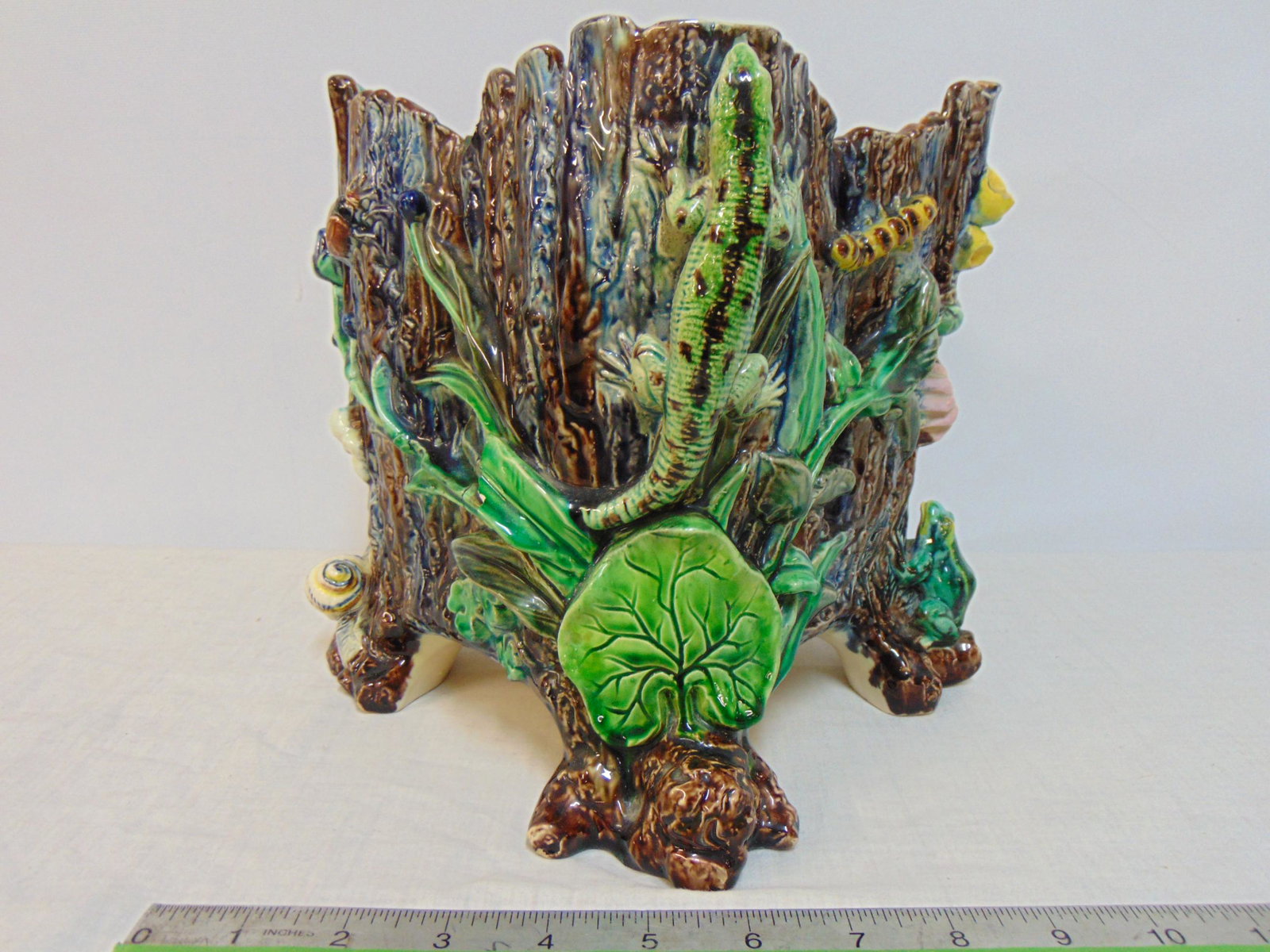 Majolica planter, George Jones style, square planter with lizards, insects, leaves & snails, few: Majolica planter, George Jones style, square planter with lizards, insects, leaves & snails, few chips, 7.5" by 7.5", height is 8.75"