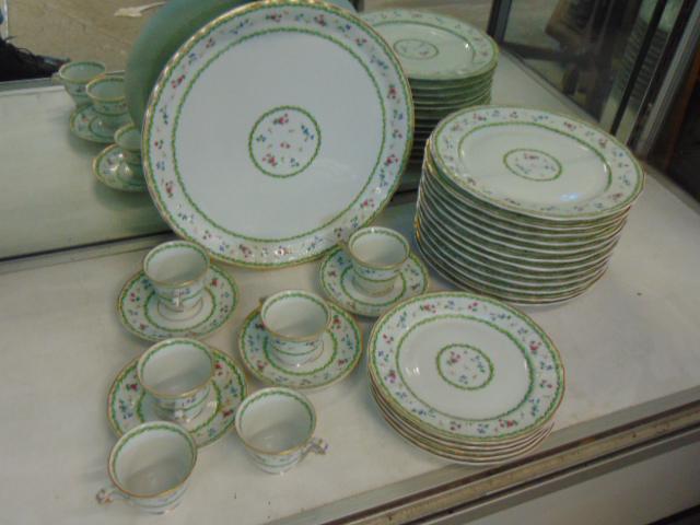 Set porcelain plates, cups, "Artois", by Bernardaud Limoges, floral decorated, includes 12 dinner: Set porcelain plates, cups, "Artois", by Bernardaud Limoges, floral decorated, includes 12 dinner plates, large serving plate, 6 cups, 4 saucers, 5 bread plates