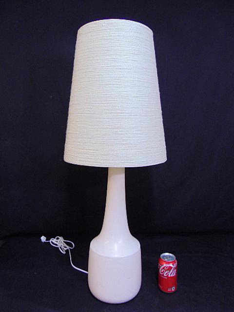 Lotte and Gunnar Bostlund MCM table lamp, with original shade, in white, good condition, lamp is: Lotte and Gunnar Bostlund MCM table lamp, with original shade, in white, good condition, lamp is 34.75" tall
