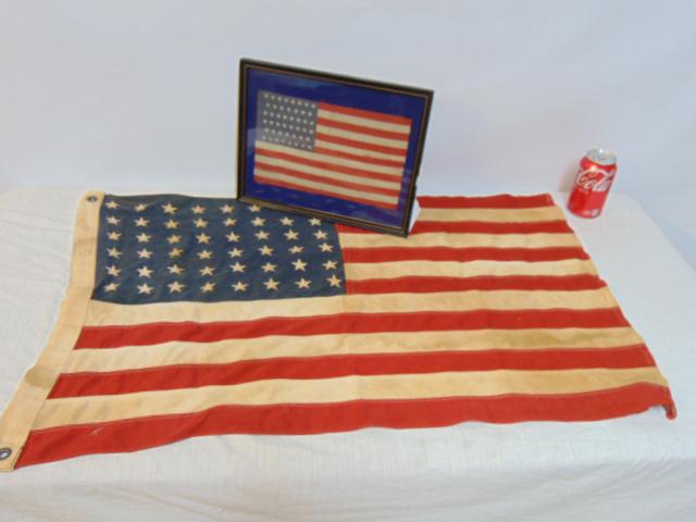 2 US flags, 46 star, silk, Oklahoma & 48 star flag, markings illegible, 46 star flag is 6.5' by: 2 US flags, 46 star, silk, Oklahoma & 48 star flag, markings illegible, 46 star flag is 6.5' by 10.25" tear in center, framed, 48 star flag is 20.5" by 33.5", has some loose stitches