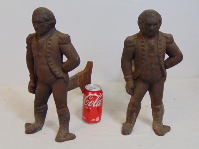 Pair George Washington andirons, cast iron, part of foot missing, height is 14.75", depth is 16",: Pair George Washington andirons, cast iron, part of foot missing, height is 14.75", depth is 16", marked on side "D.B VA"