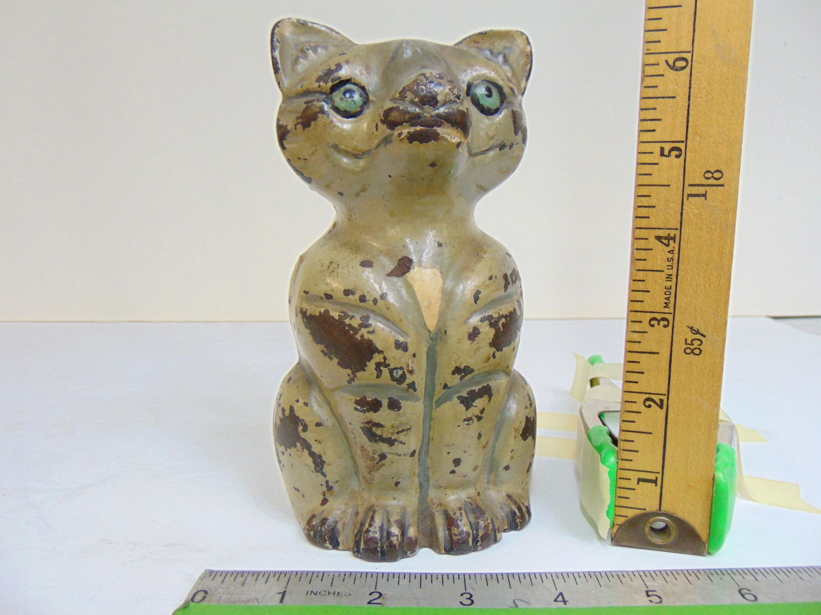 Cast iron Cat doorstop, in light beige, original paint, height is 6 7/8": Cast iron Cat doorstop, in light beige, original paint, height is 6 7/8"