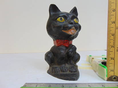 Cast iron Cat doorstop by Eastern Specialty MFG. Co. 62, black paint, yellow eyes, 7.5" tall.: Cast iron Cat doorstop by Eastern Specialty MFG. Co. 62, black paint, yellow eyes, 7.5" tall.