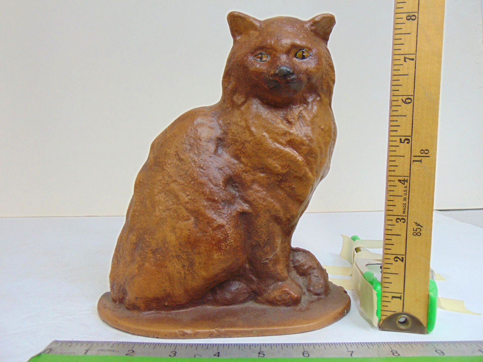 Cast iron Cat doorstop, brown paint, back edge appears broken, 8 5/8" tall, width at base is 7.75" (1 of 6)