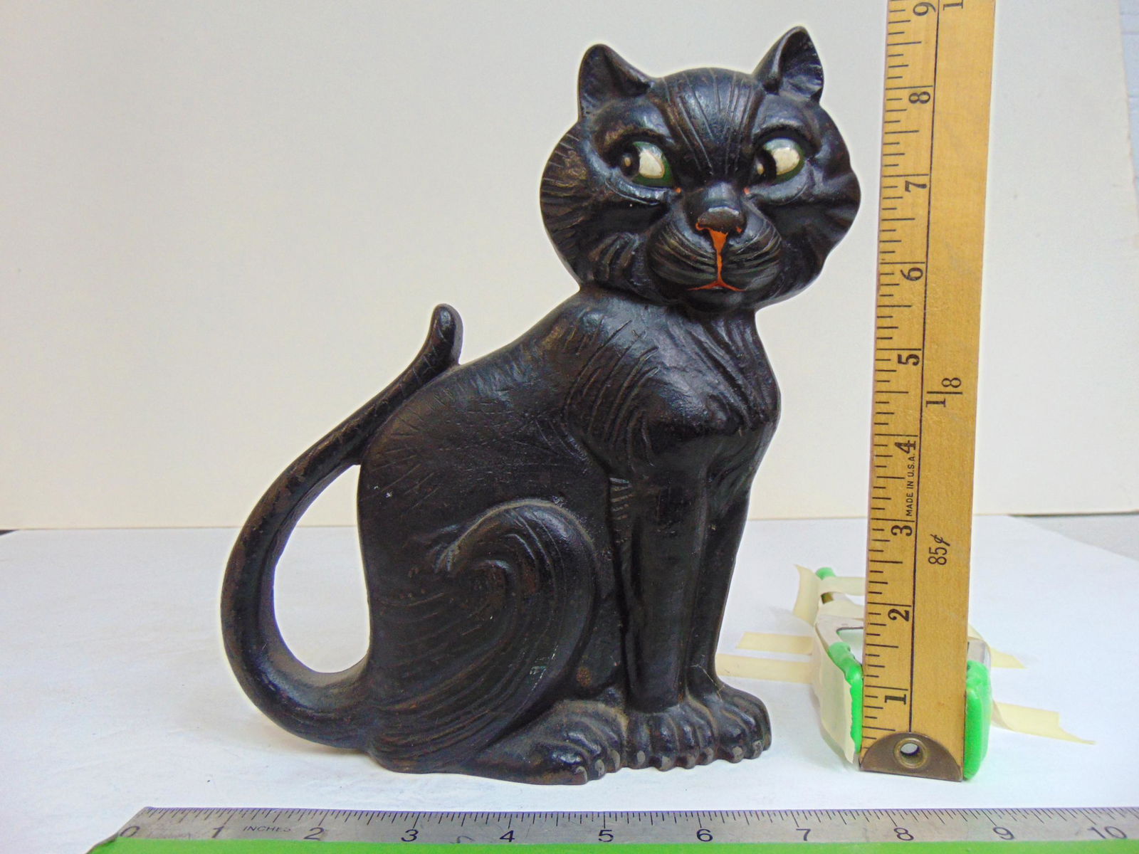 Cast iron Cat doorstop by A.M. Greenblatt Studio, Copyright 1927, #20, in black paint, height is 9": Cast iron Cat doorstop by A.M. Greenblatt Studio, Copyright 1927, #20, in black paint, height is 9"