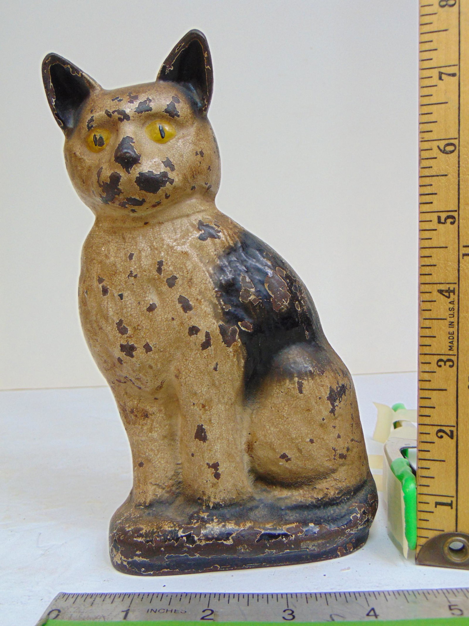 Cast iron Cat doorstop, white & black with yellow eyes, cat is 7.5" tall: Cast iron Cat doorstop, white & black with yellow eyes, cat is 7.5" tall