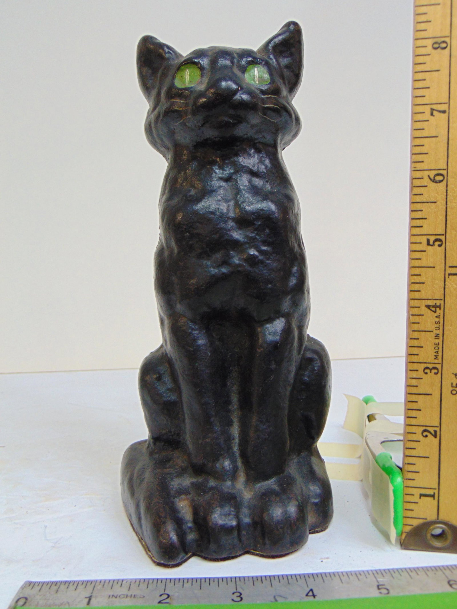 Cast iron Cat doorstop, black cat with green eyes, #10 on back, height is 9 1/8" (1 of 5)