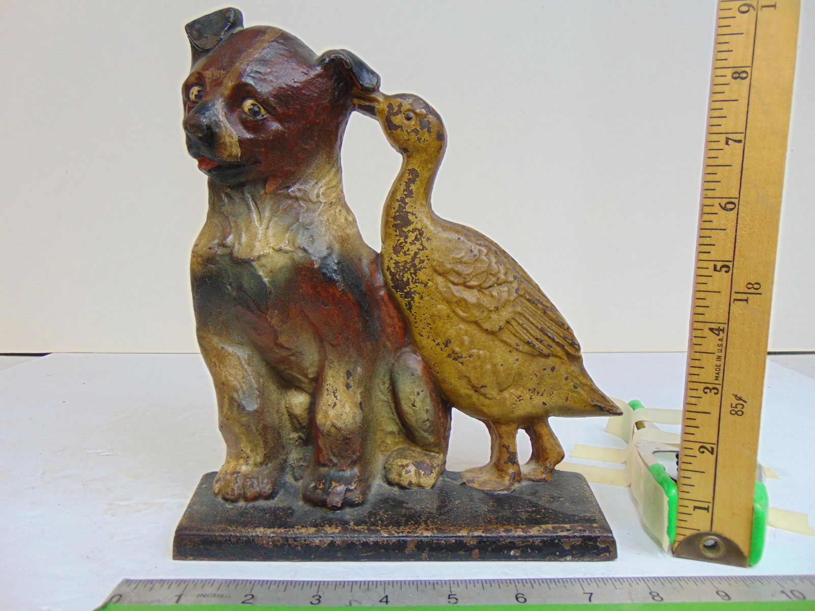 Cast iron doorstop by A.M. Greenblatt, Copyright 1925, Boston, original paint, height is 9.75" (1 of 6)