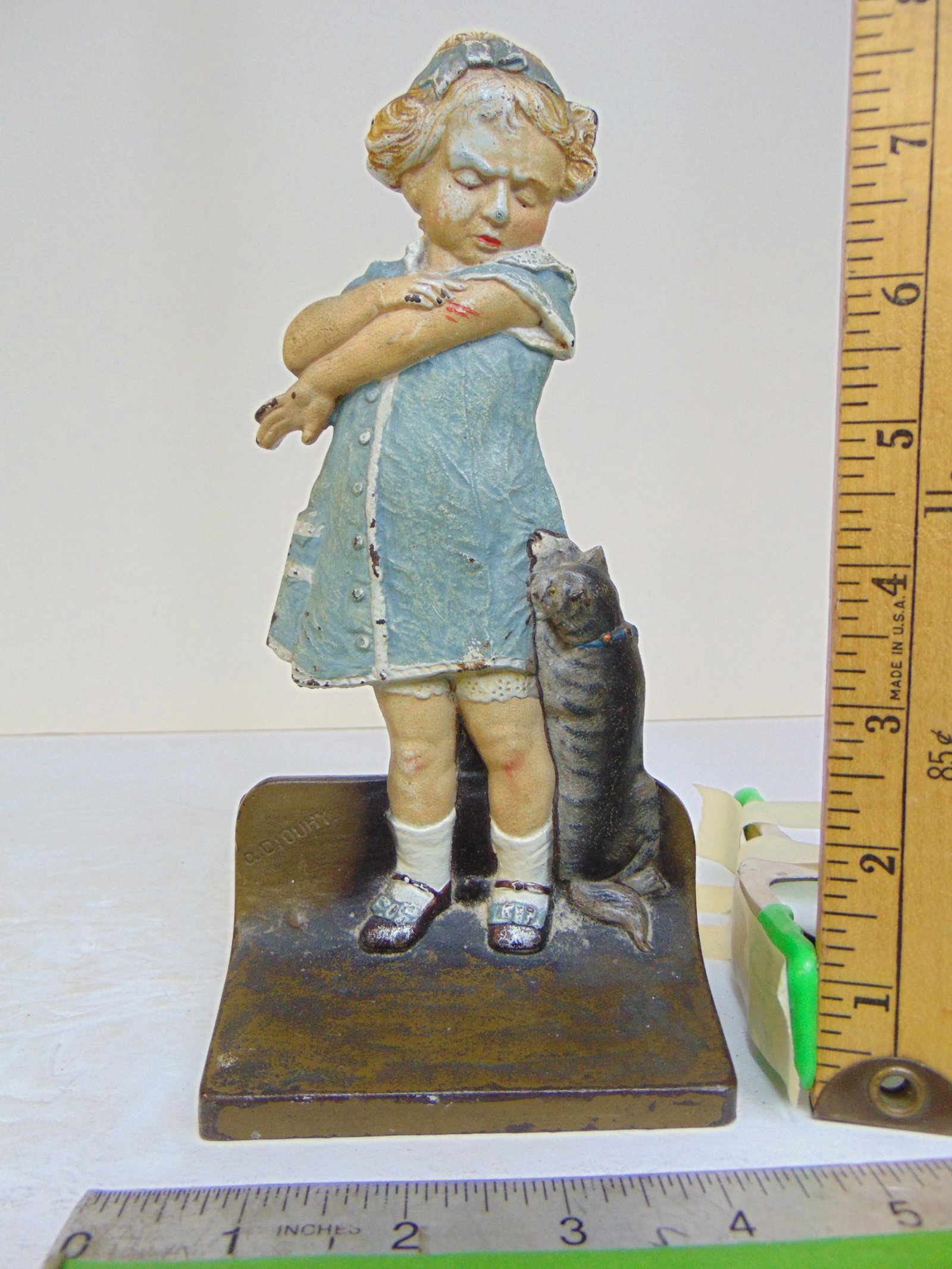Cast iron doorstop, girl with cat, girl has scratch on arm, marked CJO, 1271, height is 8 6/8" (1 of 6)
