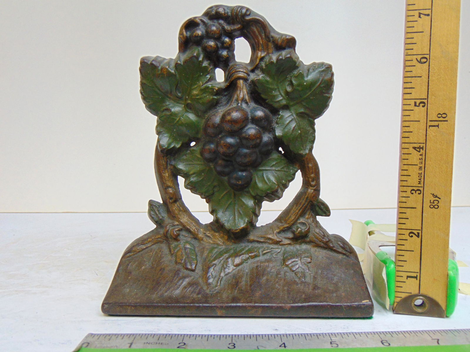Cast iron grape vine doorstop, cluster of grapes & leaves, height is 7 7/8" (1 of 4)