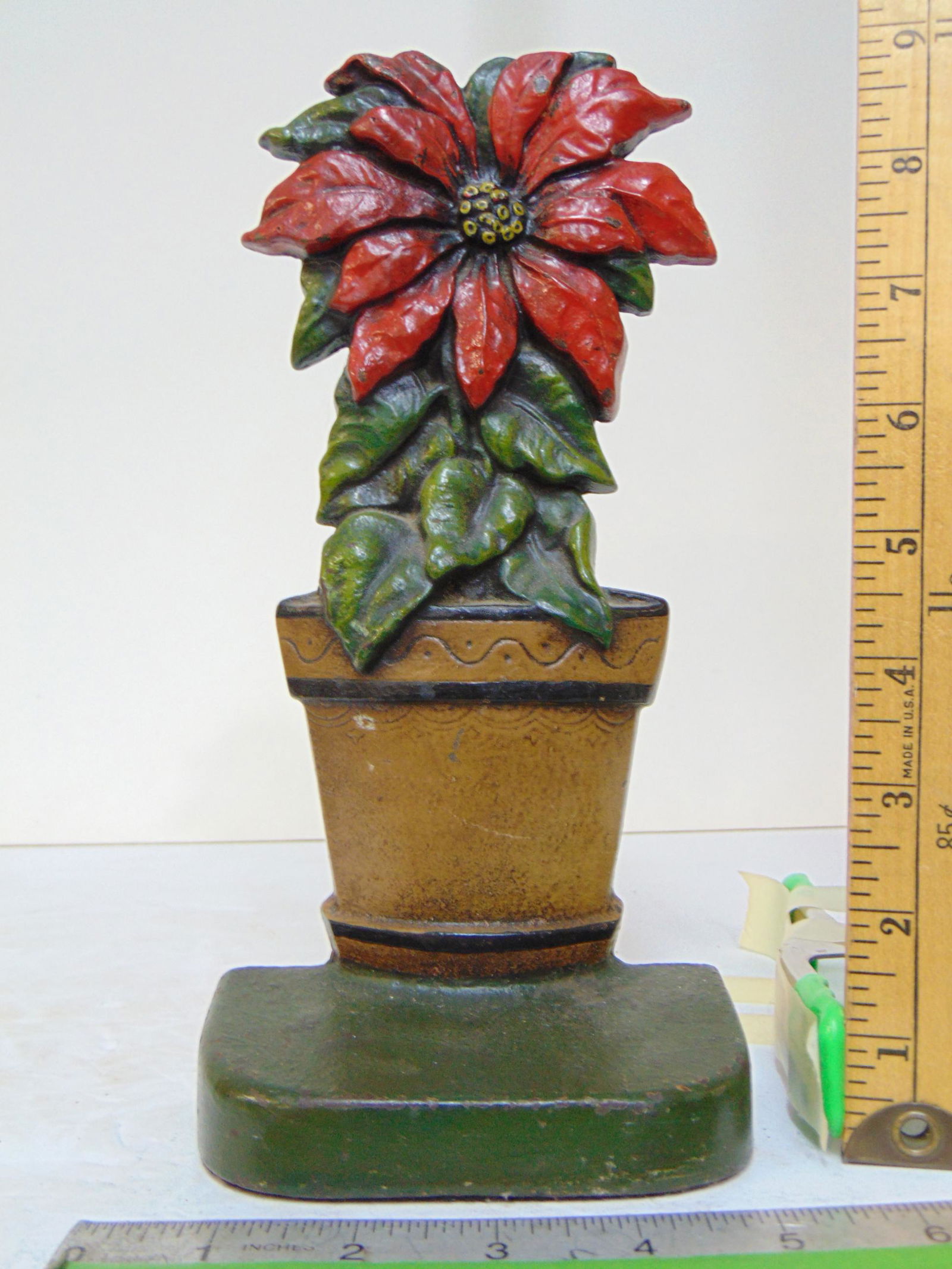 Cast iron floral doorstop, single red flower in pot, marked # 37, height is 9 5/8" (1 of 5)