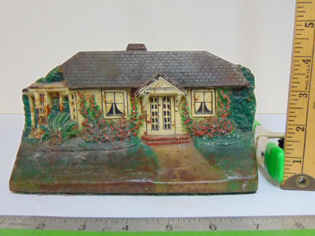 Cast iron doorstop, house with garden, signed C.J.O., 8" wide, height is 4.5" (1 of 5)