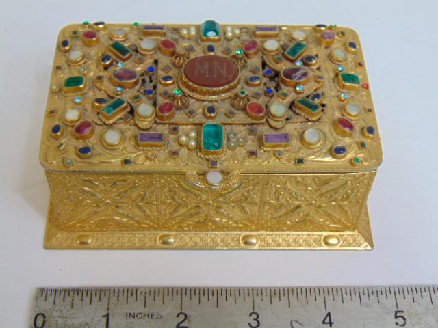 Exceptional jeweled box with central intaglio with initials "M.N", blue velvet interior, box is: Exceptional jeweled box with central intaglio with initials "M.N", blue velvet interior, box is 4.75" by 3 1/8", height is 2"