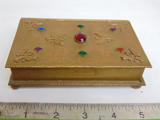 Vintage jeweled trinket box, book shaped, central faceted red glass stone with 6 smaller diamond (1 of 4)