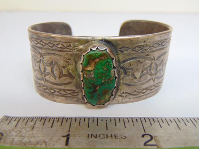 Jewelry. Navajo Old pawn sterling turquoise cuff/bracelet; central green oval stone; stampwork; (1 of 4)