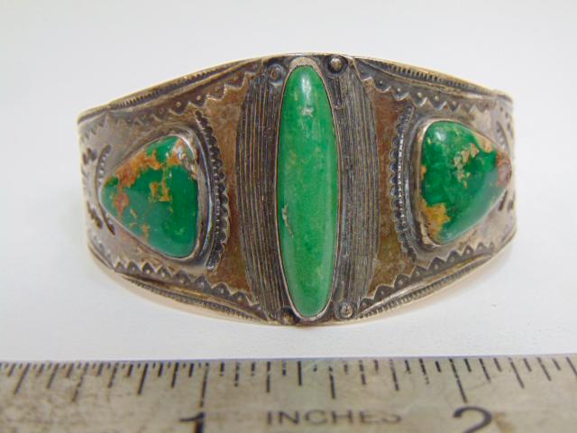 Jewelry. Navajo Old pawn sterling & green turquoise cuff/bracelet; one central elongated green stone (1 of 4)