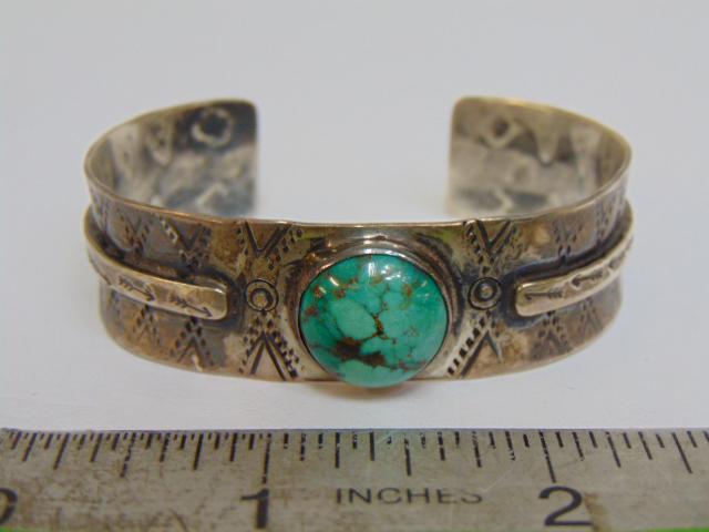 Jewelry. Navajo Old pawn blue turquoise sterling cuff/bracelet; one round stone with veins; (1 of 4)