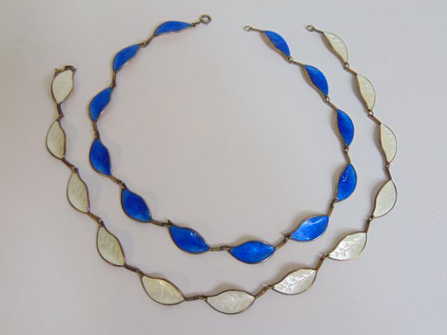 Jewelry. (2) David Andersen leaf necklaces enamel & sterling. blue guilloche enamel leaf necklace &: Jewelry. (2) David Andersen leaf necklaces enamel & sterling. blue guilloche enamel leaf necklace & white guilloche enamel leaf necklace, both 15 3/4" total length, enamel in good condition, sterling