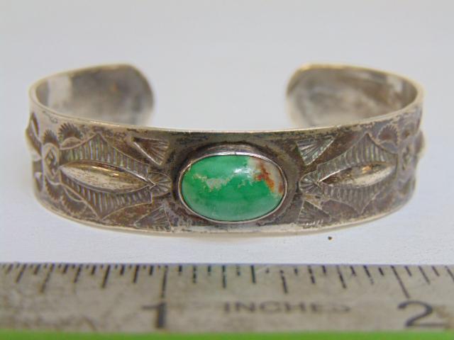 Jewelry. Navajo old pawn turquoise sterling cuff/bracelet, one central oval green stone, 24.50 (1 of 4)