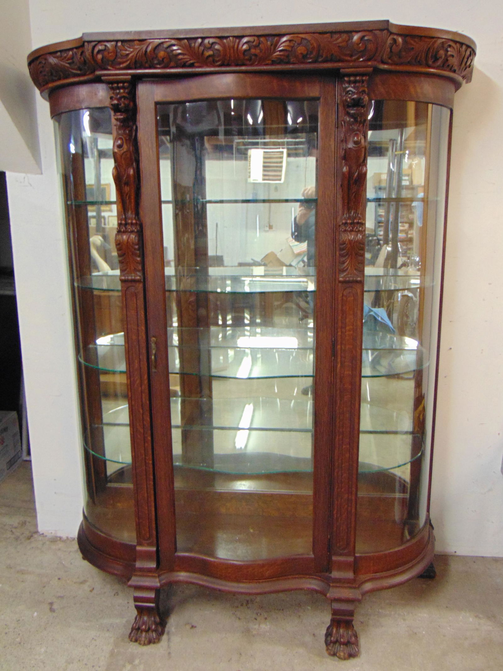 Antique oak curved glass china sale cabinet with claw feet