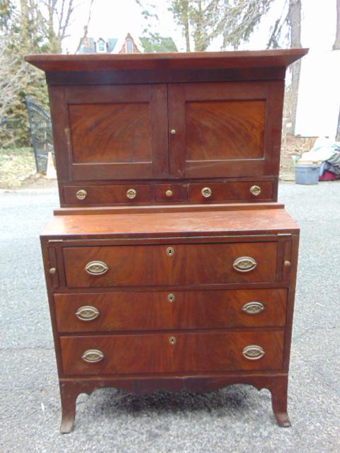 Small mahogany Hepplewhite style desk, triple drawer base, two door over two drawer top, desk is (1 of 4)