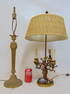 2 French bronze lamps, one with applied porcelain flowers & linen shade, other has single column, no