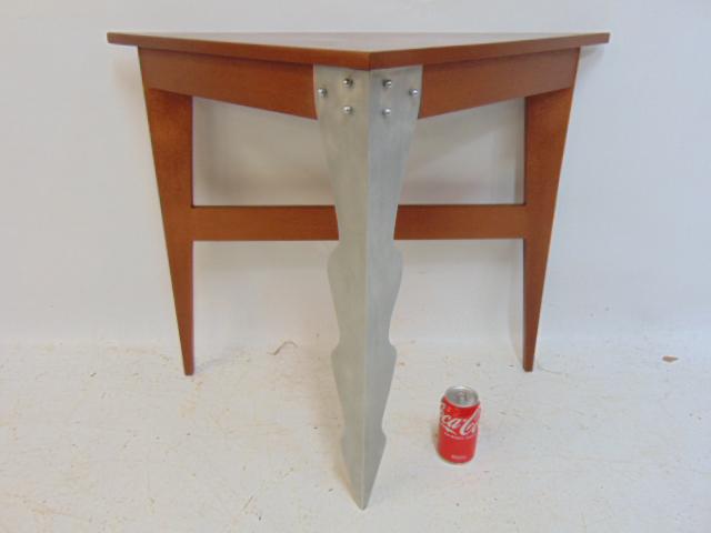 Triangle table, by Nicholas Simile, with one aluminum leg, table is 33" wide, 16.5" deep, height is: Triangle table, by Nicholas Simile, with one aluminum leg, table is 33" wide, 16.5" deep, height is 26"