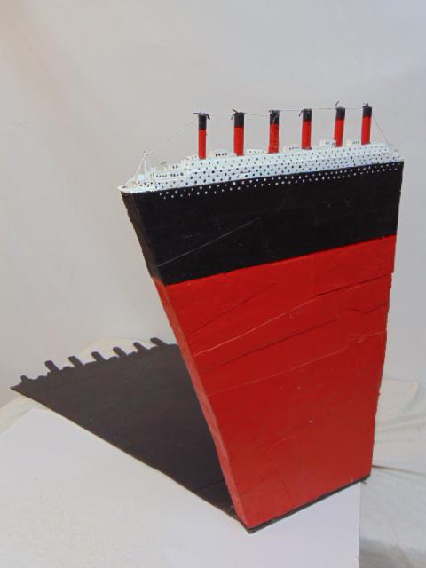 Sculpture, "Ocean Liner", by Richmond Johnston, painted wood sculpture of a steamship throwing a: Sculpture, "Ocean Liner", by Richmond Johnston, painted wood sculpture of a steamship throwing a shadow, 26.5" tall.