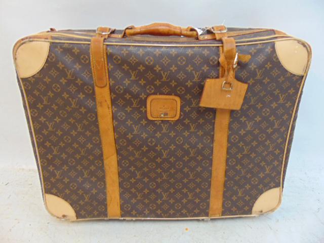 Louis Vuitton soft case suitcase, bottom worn (steel wire visible), suitcase is 28.5" by 21", by 9" (1 of 6)
