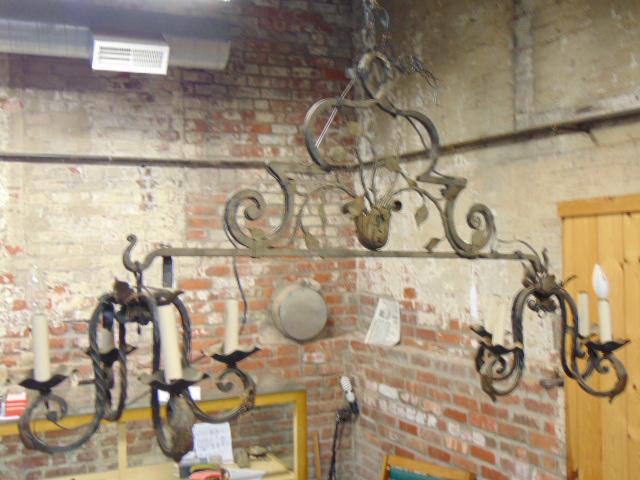 Wrought iron double arm chandelier or hanging fixture, width is 541", 4 arms on each end. (1 of 4)