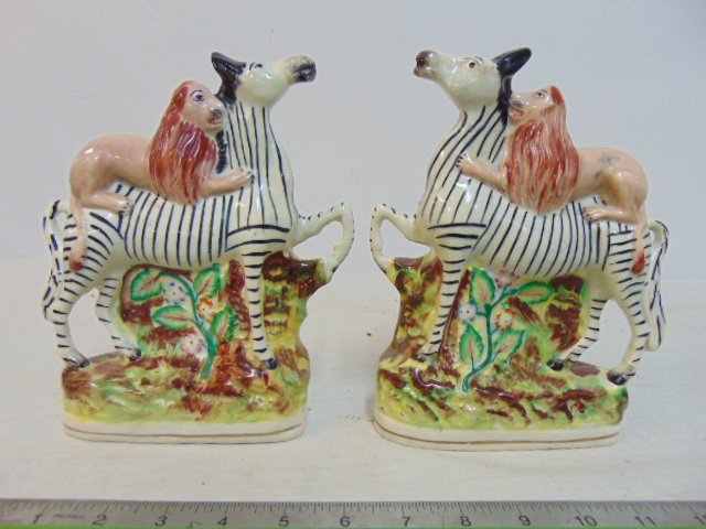 Pair Staffordshire figurines, lions riding zebras (1 of 5)