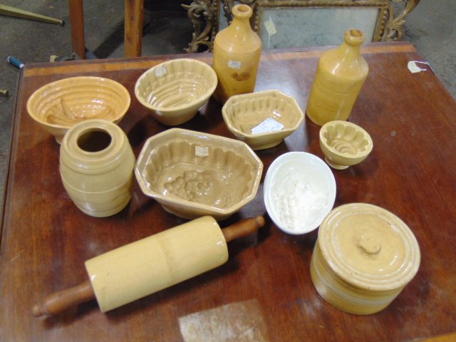 Lot of yellowwar glazed kitchen ware, includes several wheat molds, corn molds, dough roller, (1 of 7)