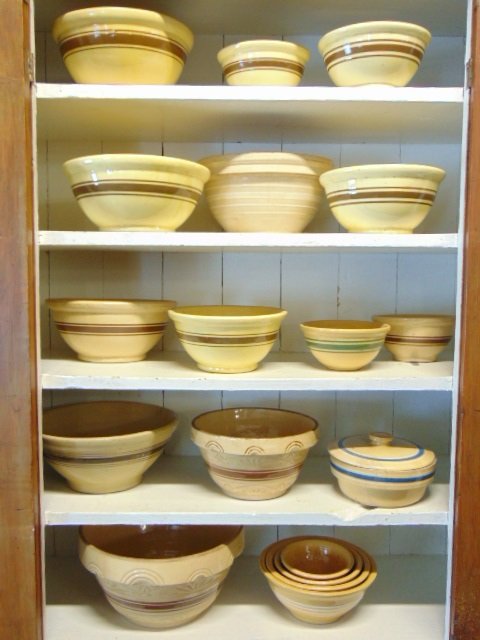 Collection of yellowware bowls, Roseville and others, includes a matching set of 4,a lidded bowl& 13 (1 of 8)