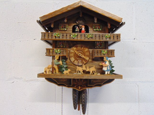 German cuckoo clock, Heidi & Peter, with three pinecone weights, on weight chain doesn't hold, needs (1 of 4)