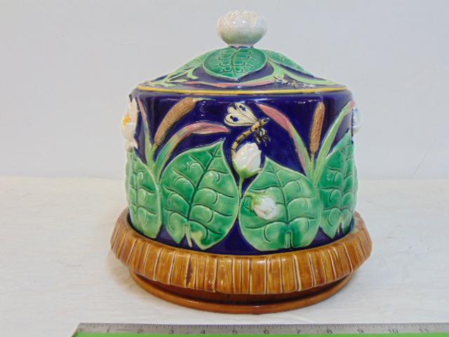 George Jones style Majolica covered cheese server, decorated with leaves, dragon flies, flowers, lid: George Jones style Majolica covered cheese server, decorated with leaves, dragon flies, flowers, lid has small hairline, base is 10.75", height as shown is 10.5"