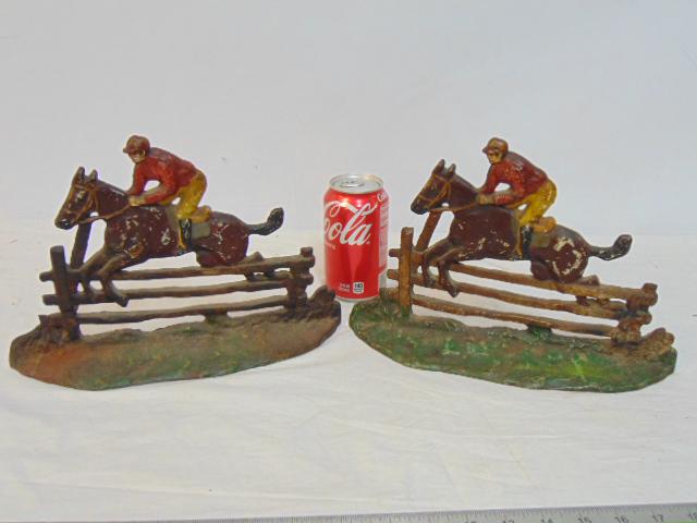 Pair equestrian bookends, (doorstops ?), jockey on horseback jumping fence, original paint, 11.75": Pair equestrian bookends, (doorstops ?), jockey on horseback jumping fence, original paint, 11.75" wide, Eastern Specialty Co